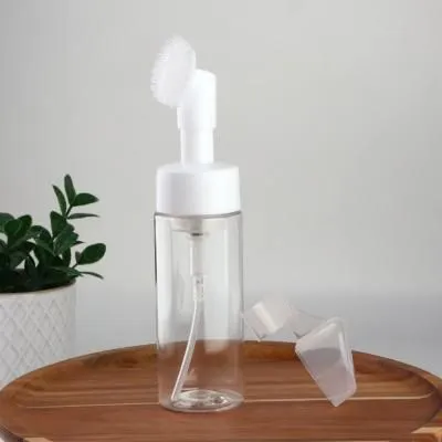 Бутылочка с щёткой для умывания с дозатором 150...